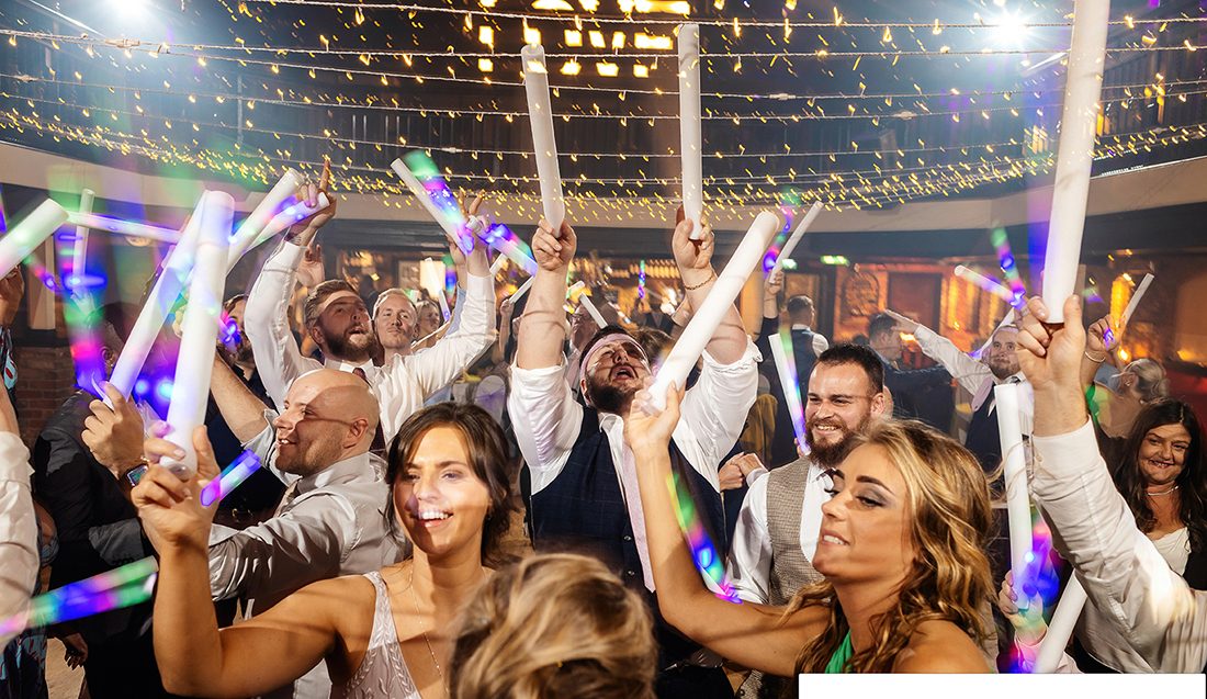 Guests packed onto the dance floor with their hands in the air